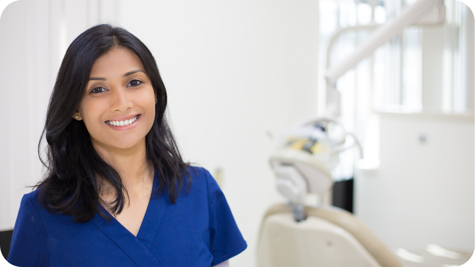 Dentist with peace of mind knowing she has appropriate dental indemnity cover in place